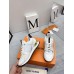 Louis Vuitton Women's White Run Away Sneakers with Gold Details