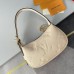 Louis Vuitton Mini Moon Bag In Cream Monogram Empreinte Leather M82519