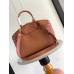 Louis Vuitton Lock It MM Bag in Taurillon Leather M22925