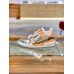 Louis Vuitton Men's LV Trainer Sneakers In Silver Metallic Calfskin