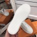 Louis Vuitton White Time Out Sneakers with Gold LV Circle